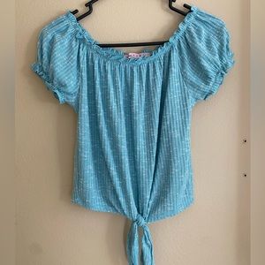 This is an extra small dark teal shirt from Crave Fame.